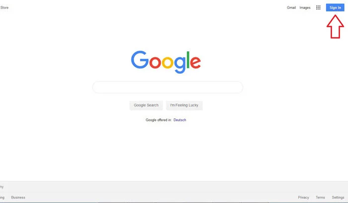 صفحه اصلی گوگل با فلش قرمز روی دکمه Sign in برای ورود به حساب