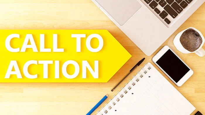 عبارت CALL TO ACTION روی برچسب زرد کنار لپ‌تاپ، گوشی و قهوه